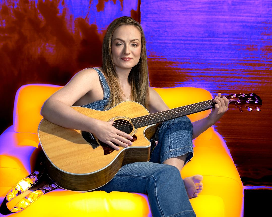 Jen playing guitar