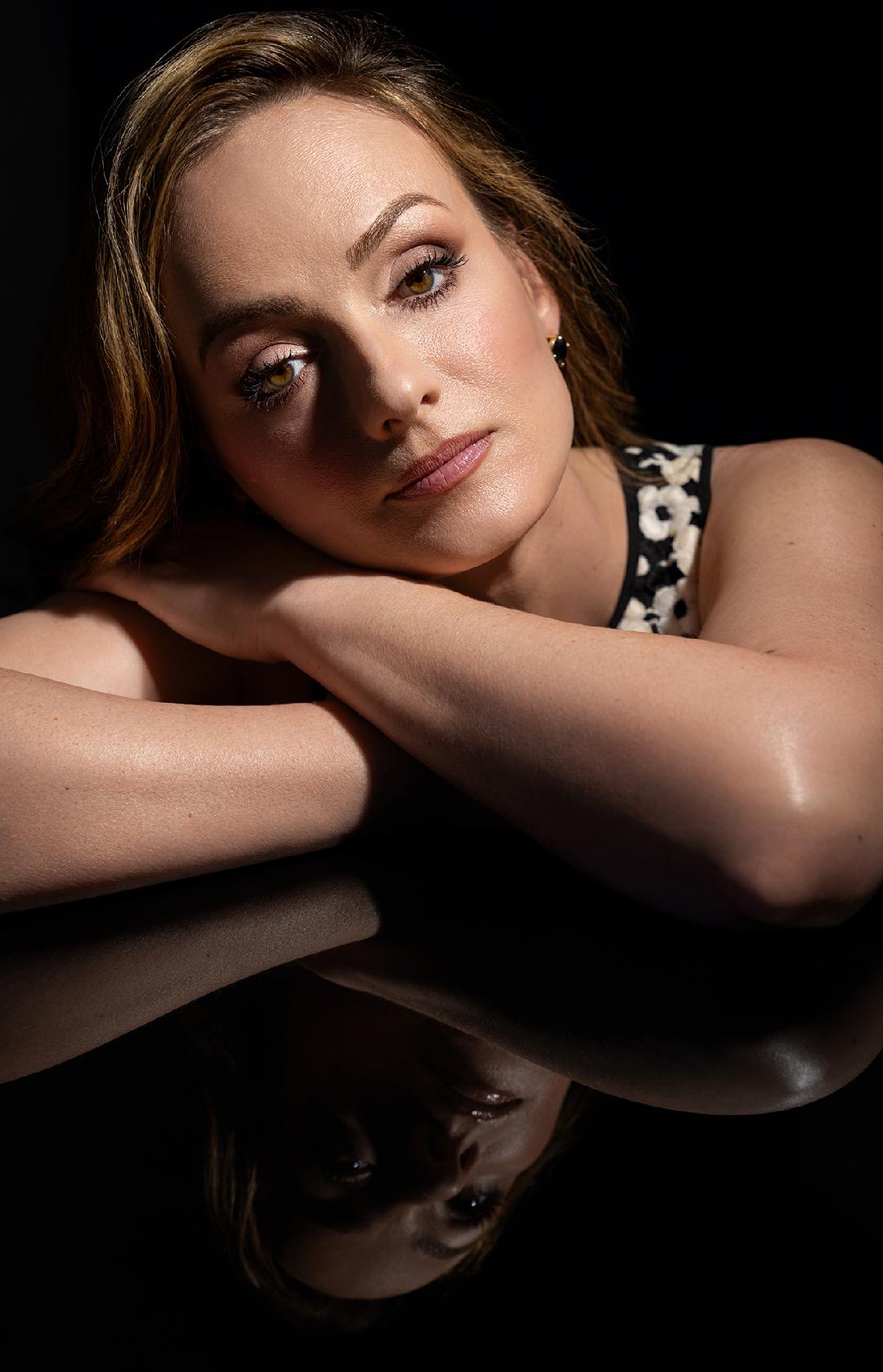 Jen with arms folded